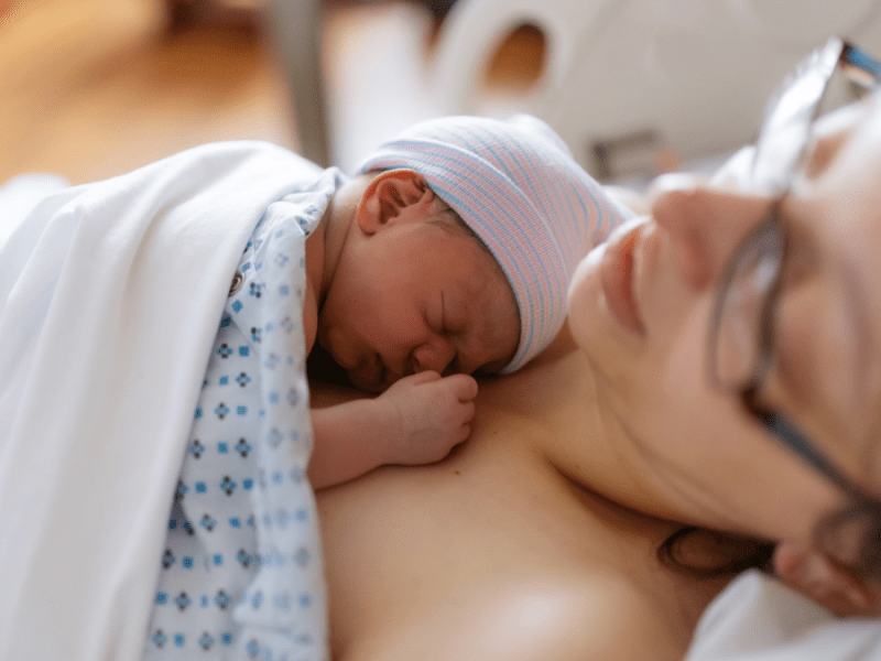 Mother hold newborn baby in hospital