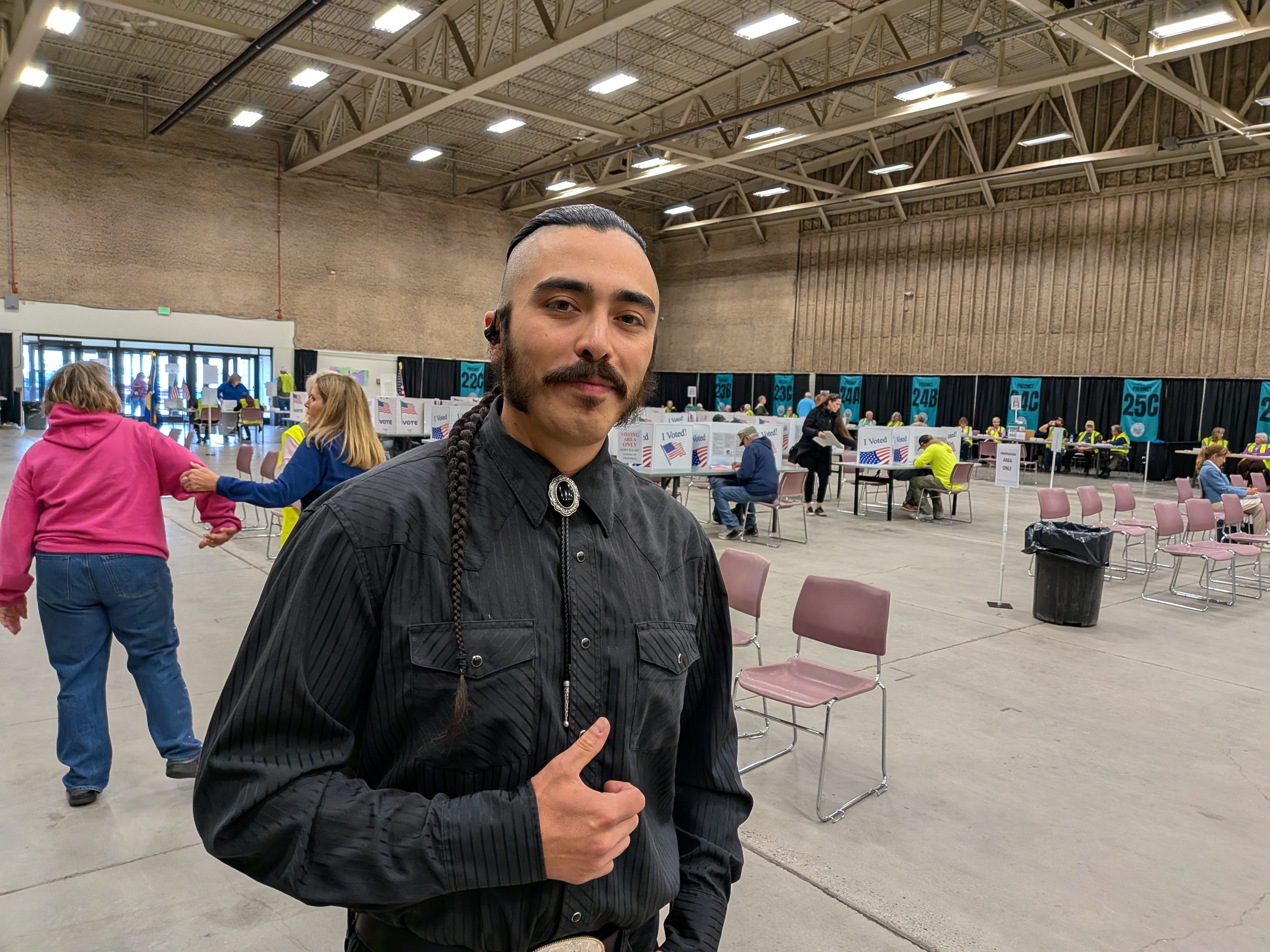 Democratic congressional candidate sam lux poses at a polling place in great falls montana
